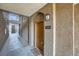 Building entryway with brown door and walkway at 2900 Sunridge Heights Pkwy # 1514, Henderson, NV 89052