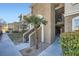 Tan two-story building with stairs and walkway at 2900 Sunridge Heights Pkwy # 1514, Henderson, NV 89052