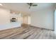 Open concept living room with kitchen and wood floors at 2900 Sunridge Heights Pkwy # 1514, Henderson, NV 89052