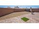 Backyard with patio, shed, and artificial turf at 2905 Carothers Ct, North Las Vegas, NV 89032