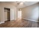 Bedroom with wood-look floors and ceiling fan at 2905 Carothers Ct, North Las Vegas, NV 89032