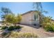 Side view of the house showcasing desert landscaping at 2905 Carothers Ct, North Las Vegas, NV 89032