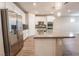 Modern kitchen with stainless steel appliances and granite countertops at 2905 Carothers Ct, North Las Vegas, NV 89032