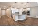 Modern kitchen with a large island and white cabinets at 2905 Carothers Ct, North Las Vegas, NV 89032