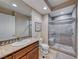 Elegant bathroom with walk-in shower and updated vanity at 30 Via Mantova # 108, Henderson, NV 89011