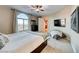 Bright bedroom with large window and built-in shelving at 30 Via Mantova # 108, Henderson, NV 89011