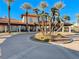 Spanish-style building exterior with palm trees at 30 Via Mantova # 108, Henderson, NV 89011