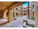 Inviting courtyard with brick paving and lush landscaping at 30 Via Mantova # 108, Henderson, NV 89011