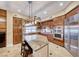 Gourmet kitchen with granite island and stainless appliances at 30 Via Mantova # 108, Henderson, NV 89011