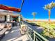 Outdoor patio with seating and golf course views at 30 Via Mantova # 108, Henderson, NV 89011