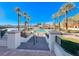 Resort-style pool with a relaxing atmosphere and palm trees at 30 Via Mantova # 108, Henderson, NV 89011