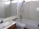 Clean bathroom with toilet, tub, and single sink vanity at 3139 Ocotillo Dr, Laughlin, NV 89029