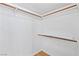 Walk-in closet with wood shelving and a double rod at 3139 Ocotillo Dr, Laughlin, NV 89029