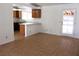 Open dining area with tile floors and kitchen access at 3139 Ocotillo Dr, Laughlin, NV 89029