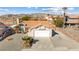 One-story house with tile roof, attached garage, and desert landscaping at 3139 Ocotillo Dr, Laughlin, NV 89029