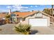 Single-story home with tile roof and attached garage at 3139 Ocotillo Dr, Laughlin, NV 89029