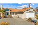 Single-story home with tile roof and gravel landscaping at 3139 Ocotillo Dr, Laughlin, NV 89029