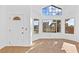 Bright living room with hardwood floors and large windows at 3139 Ocotillo Dr, Laughlin, NV 89029