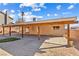 Covered patio with wood supports and concrete slab at 3139 Ocotillo Dr, Laughlin, NV 89029