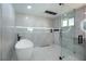 Spa-like bathroom with a soaking tub and a large glass shower at 3180 S Tioga Way, Las Vegas, NV 89117