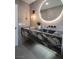 Bathroom with floating vanity and modern fixtures at 3180 S Tioga Way, Las Vegas, NV 89117