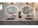 Contemporary bathroom vanity features double sinks and sleek mirrors at 3180 S Tioga Way, Las Vegas, NV 89117