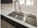 Modern kitchen sink with a pull-down faucet at 3180 S Tioga Way, Las Vegas, NV 89117