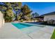 Relaxing swimming pool with a large concrete deck at 3180 S Tioga Way, Las Vegas, NV 89117