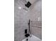 Modern shower with black fixtures and gray tile at 3180 S Tioga Way, Las Vegas, NV 89117