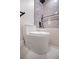 Modern toilet with elongated bowl and white finish at 3180 S Tioga Way, Las Vegas, NV 89117