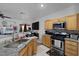 Kitchen with stainless steel appliances and granite countertops at 3309 Jamaica Princess Pl # 3, North Las Vegas, NV 89084