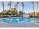 Community swimming pool with surrounding landscaping at 3309 Jamaica Princess Pl # 3, North Las Vegas, NV 89084