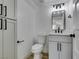 Modern bathroom with gray vanity and quartz countertop at 3367 Vema Dr, Las Vegas, NV 89121