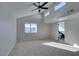 Bright and airy bedroom with vaulted ceilings and a ceiling fan at 3367 Vema Dr, Las Vegas, NV 89121