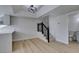 Modern dining room with hardwood floors and staircase at 3367 Vema Dr, Las Vegas, NV 89121