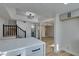 Modern kitchen with white cabinets, quartz countertops and island at 3367 Vema Dr, Las Vegas, NV 89121