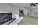 Living room with fireplace, wet bar and staircase leading upstairs at 3367 Vema Dr, Las Vegas, NV 89121