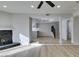 Living room with an open floor plan showing kitchen and stairs at 3367 Vema Dr, Las Vegas, NV 89121