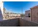 Private patio with view of residential neighborhood and mountains at 3367 Vema Dr, Las Vegas, NV 89121