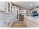 Modern kitchen with white cabinets, stainless steel appliances, and an island at 3446 Cactus Springs Dr, Las Vegas, NV 89115