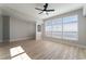 Living room with vinyl flooring and a ceiling fan at 3446 Cactus Springs Dr, Las Vegas, NV 89115