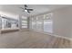 Open living room with kitchen view and hardwood floors at 3446 Cactus Springs Dr, Las Vegas, NV 89115