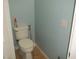 Small, light blue half bathroom with tile floor at 3925 Vulcan St, Las Vegas, NV 89122