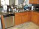 Kitchen with stainless steel dishwasher and granite countertops at 3925 Vulcan St, Las Vegas, NV 89122