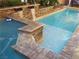 Relaxing pool area with a spa and cascading waterfalls at 3925 Vulcan St, Las Vegas, NV 89122