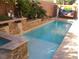 Stunning rectangular pool with waterfall feature at 3925 Vulcan St, Las Vegas, NV 89122