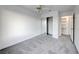 Bright bedroom with mirrored closet doors at 402 Bell Ave, Henderson, NV 89015