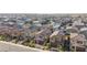 Aerial view showcasing a row of houses with solar panels in a community at 4138 Bayley Skye Ave, Las Vegas, NV 89141