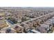 Aerial view of a residential neighborhood with houses and solar panels at 4138 Bayley Skye Ave, Las Vegas, NV 89141