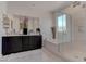 Spa-like bathroom with double vanity and soaking tub at 4138 Bayley Skye Ave, Las Vegas, NV 89141